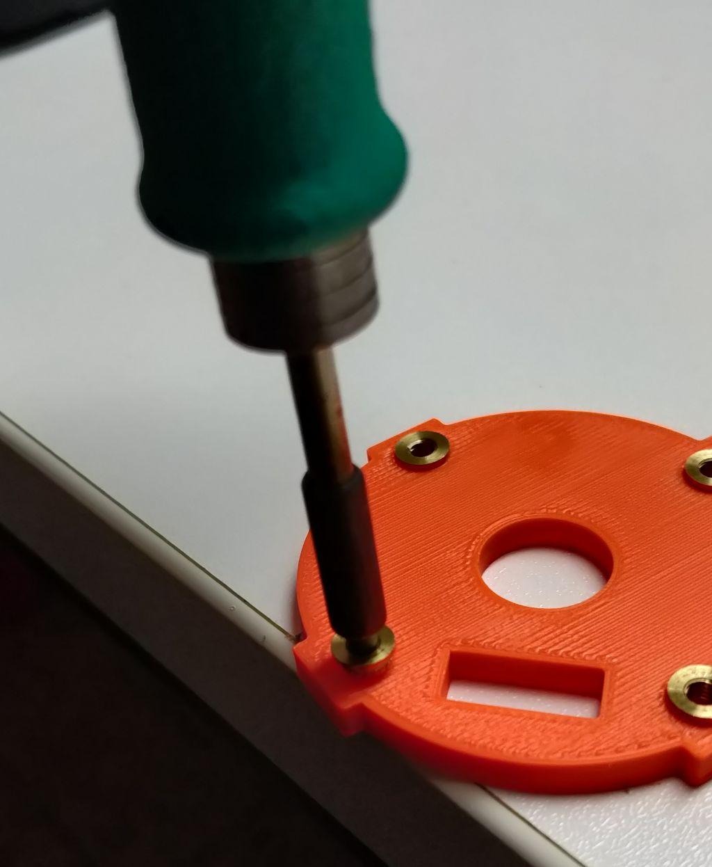 insert-with-solder-iron.jpeg